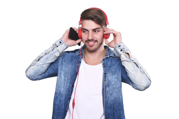 Young man listening to music with smartphone