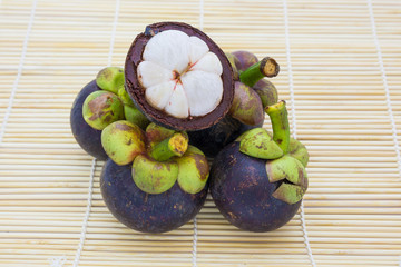 Mangosteen queen of fruits on traditional mat is most popular in Thailand and International