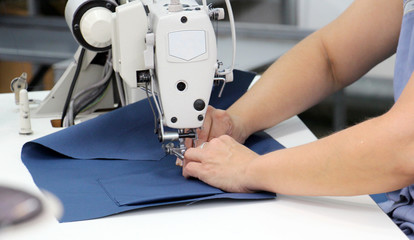 Female worker on textile production industry