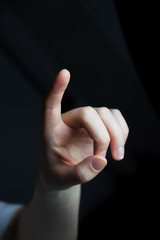 Businesswoman pointing finger