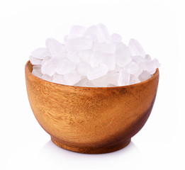 Rock sugar in bowl on white background