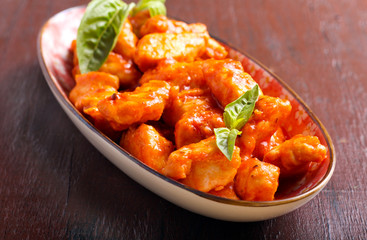 Chicken fillet bites in tomato sauce