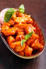 Chicken fillet bites in tomato sauce