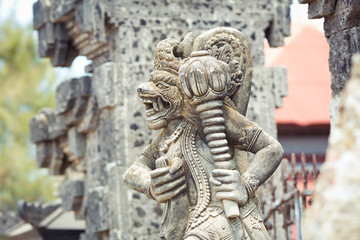statue at the entrance to the temple, Bali, Indonesia