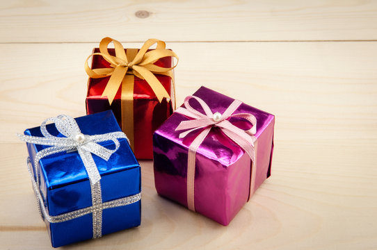 Gift boxes on a wooden floor