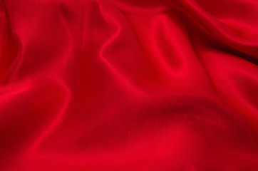 red satin or silk fabric as background