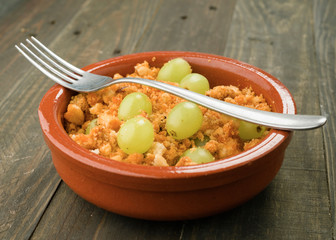ration shepherd crumbs with fresh grapes, typical Spanish