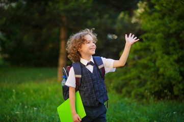 Curly blonde first-grader goes to school.
