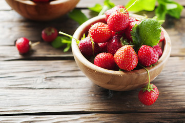 Sweet fresh strawberry on the wooden table