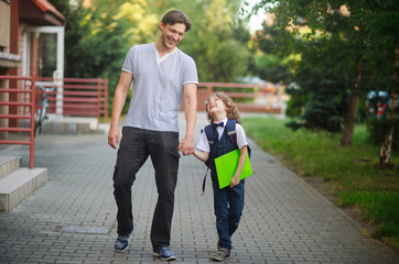 Obraz premium Father escorted to school by his son.