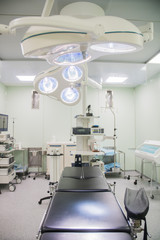 bright empty operating room in a hospital