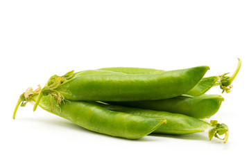 fresh green peas isolated on a white background