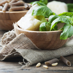 Ingredients for italian pesto with basil and cheese