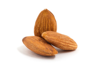 group of almonds isolated on white