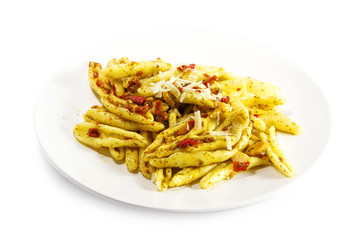 pasta variety called capunti with garlic and oil, pickled tomatoes and parmesan cheese,  isolated on white