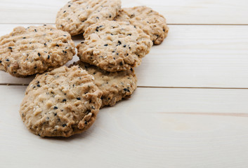 close up view cookies over wooden background