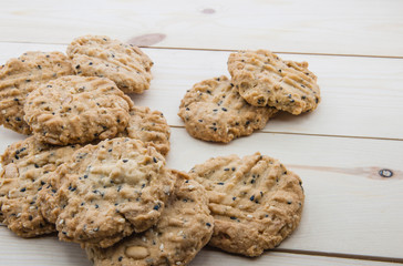 close up view cookies over wooden background