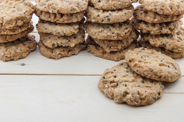 close up view cookies over wooden background