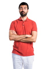 Fototapeta premium Handsome man with his arms crossed