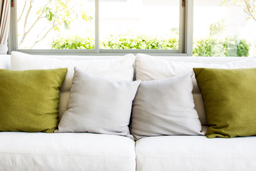 Sofa and pillows in living room.