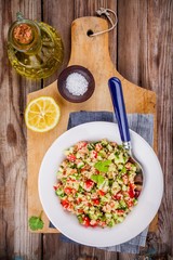 homemade tabbouleh salad with quinoa and vegetables