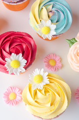 Obraz na płótnie Canvas cupcake. Delicious cupcakes. Colorful cupcakes. swirl cupcake.