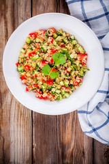 homemade tabbouleh salad with quinoa and vegetables