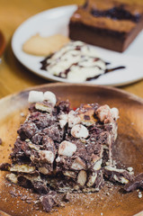 Chocolate Marshmellow Brownies. brownie on a wood table. selecti