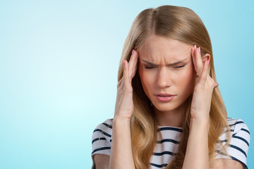 Beautiful young woman portrait Headache