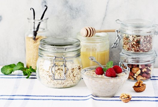 Overnight Oats With Raspberry And Various Superfoods Toppings.Healthy Eating Concept. Selective Focus 