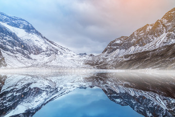 Fototapeta na wymiar reflection of snow mountain in Yading China