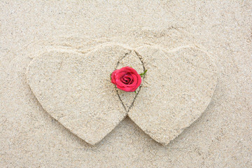 Two heart shape and red rose