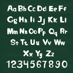 White letters on chalkboard background. Alphabet set with letters and numbers