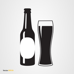 Bottle of dark craft beer with glass and label