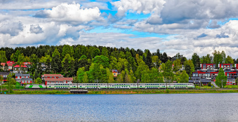Naklejka premium Passenger train in landscape