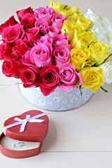 Box of roses and an engagement ring