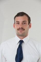 Medium shot portrait of cute businessman in shirt and tie