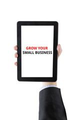 businessman hand holding digital tablet with word isolated on wh