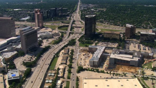 Flight approaching highway interchange in Dallas, Texas