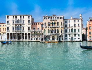 Fototapeta na wymiar Old houses by Canal Grande in Venice