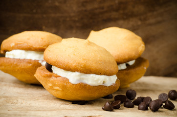 Homemade cookies with whipping cream and chocolate chip