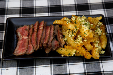 grilled meat with french fries