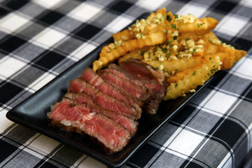 grilled meat with french fries