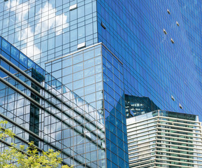 Contemporary office building blue glass wall detail
