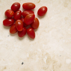 Cherry tomatoes on a marble background 