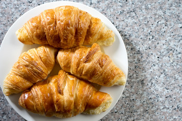 croissant bakery on gray marble