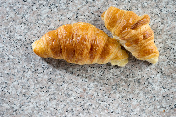 croissant bakery on gray marble
