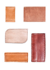 Different leather badges isolated on white