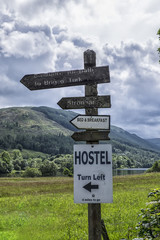 Old wooden signpost at Balquhidder, Scotland