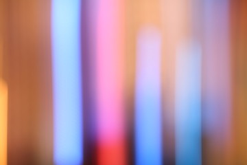 Defocused urban abstract texture. Colorful light background 